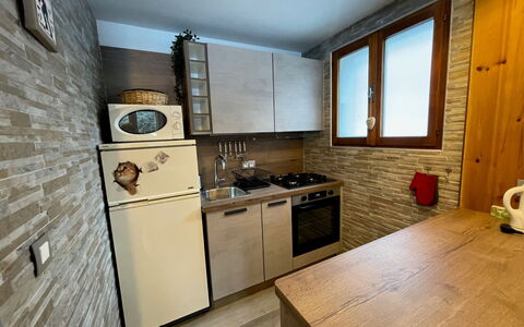 Maison Novel: Cabinetry, Countertop, Tap, Kitchen Sink, Sink, Furniture, Plumbing Fixture, Kitchen, Wood, Kitchen Stove