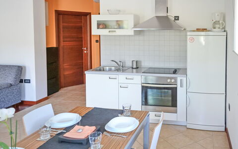 Rab Rab 220: Property, Room, Furniture, Kitchen, House, Cabinetry, Building, Interior Design, Kitchen Stove, Apartment