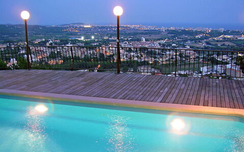 Mas Ambros: Swimming Pool, Sky, Lighting, Real Estate, Water, Reflecting Pool, Architecture, Night, Evening, City