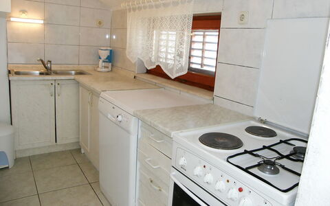 Margita: Property, Room, Countertop, Kitchen, Cabinetry, Furniture, Major Appliance, Kitchen Stove, Building, Gas Stove