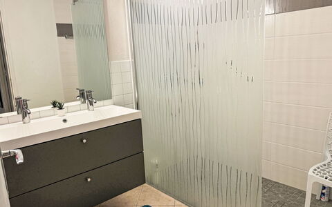 Les Alizées: Mirror, Sink, Cabinetry, Bathroom, Tap, Building, Bathroom Cabinet, Bathroom Sink, Wood, Interior Design
