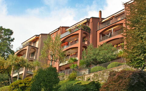 Residenza del Pascià: Cloud, Sky, Plant, Building, Tree, Land Lot, Urban Design, Grass, Window, Neighbourhood