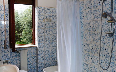 Riviera Massa: Bathroom, Room, Shower Curtain, Property, Curtain, Interior Design, Bathroom Accessory, Window Treatment, House, Textile