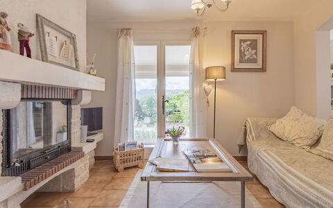 Les Iris: Furniture, Property, Table, Wood, Window, Picture Frame, Interior Design, Lighting, Architecture, Living Room