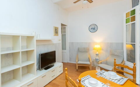 Gracia Torrijos: Furniture, Property, Table, Ceiling Fan, Window, Picture Frame, Wood, Lighting, Interior Design, Cabinetry
