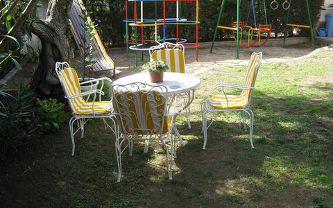 Vilafortuny: Chair, Tree, Backyard, Yard, Furniture, Table, Garden, Plant, Leisure, Outdoor Furniture