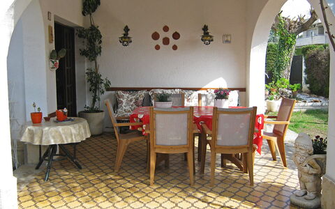 Vilafortuny: Property, Table, Furniture, Building, Plant, Decoration, Chair, Interior Design, Shade, Wood