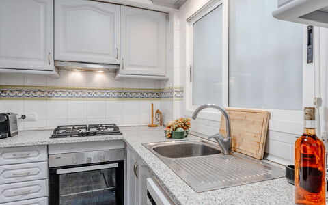 Monada: Kitchen, Countertop, Kitchen Appliance, Major Appliance, Interior Design, Kitchen Sink, Cabinetry, Flooring, Kitchen Stove, Home Appliance