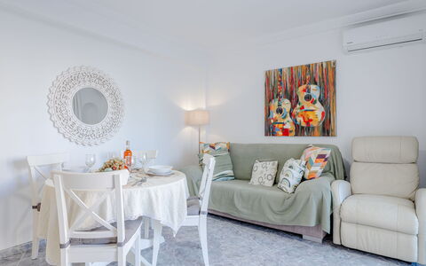 Monada: Furniture, Interior Design, Couch, Flooring, Floor, Room, Living Room, Ceiling, Wood, Table