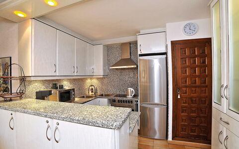 La Colina: Countertop, Room, Cabinetry, Property, Furniture, Kitchen, Interior Design, Floor, Building, Ceiling