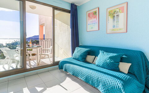 L'Ange Gardien: Furniture, Azure, Window, Interior Design, Comfort, Wood, Pillow, Floor, Building, Aqua
