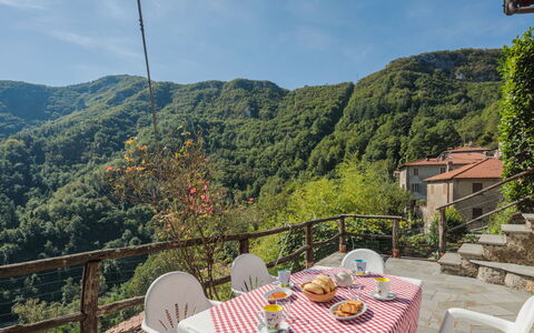Da Franca: Sky, Table, Cloud, Furniture, Plant, Mountain, Chair, Nature, Outdoor Table, Outdoor Furniture