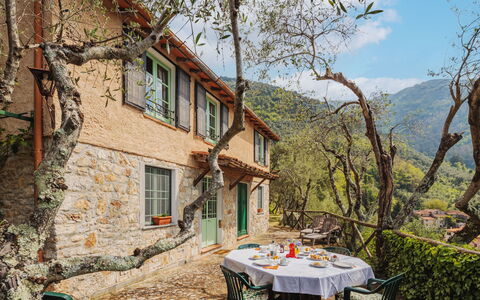 La Capannella: Sky, Table, Furniture, Daytime, Property, Plant, Mountain, Azure, Chair, Nature