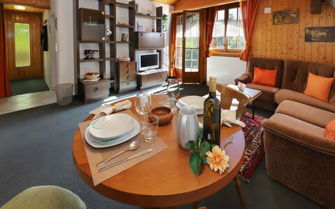 Grindelwald 104: Furniture, Wood, Interior Design, Ceiling, Couch, Flooring, Room, Living Room, Floor, Chair