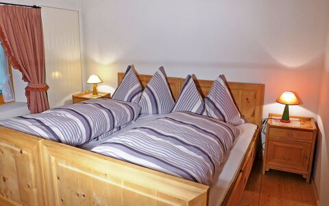 Ferienhaus Döss: Bedroom, Bed, Furniture, Room, Bed Sheet, Bed Frame, Bedding, Nightstand, Property, Mattress