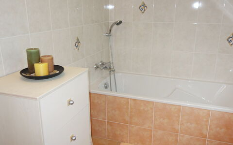 Ty Patrick: Plumbing Fixture, Property, Shower Head, Cabinetry, Tap, Bathtub, Bathroom, Shower, Floor, Flooring
