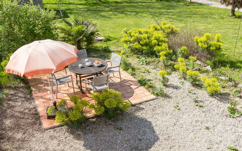 Chaumiere Natelliou: Cloud, Sky, Property, Building, Tree, Wood, Chair, Urban Design, Outdoor Furniture, Table