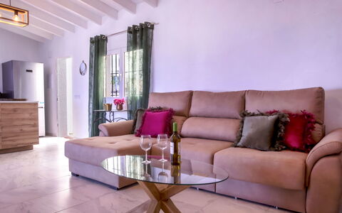 Villa Teresita: Furniture, Property, Building, Couch, Cabinetry, Table, Purple, Comfort, Wood, Interior Design