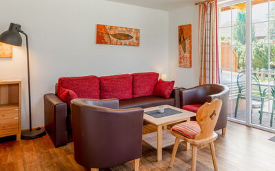 Top 1 120.1: Furniture, Couch, Table, Property, Comfort, Chair, Wood, Orange, Living Room, Lighting