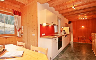 Lärche 170.6: Room, Property, Furniture, Building, Interior Design, Ceiling, Kitchen, Cabinetry, House, Floor
