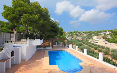Dulcinea: Cloud, Sky, Building, Table, Swimming Pool, Shade, Outdoor Furniture, Body Of Water, Tree, Chair