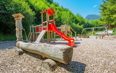 Kaufmann: Playground, Public Space, Outdoor Play Equipment, Human Settlement, City, Playground Slide, Play, Tree, Recreation, Summer