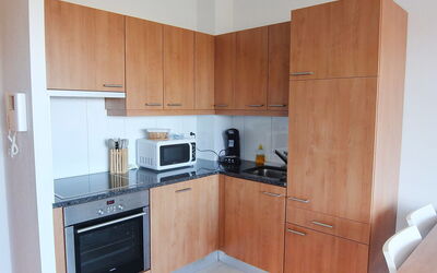 La Presqu'île 515.9: Cabinetry, Room, Property, Furniture, Kitchen, Major Appliance, Countertop, Cupboard, Building, Kitchen Stove