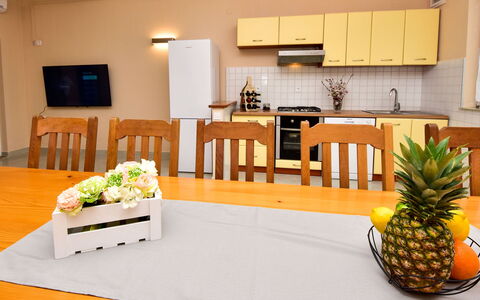 Milka: Table, Property, Furniture, Plant, Building, Orange, Interior Design, Yellow