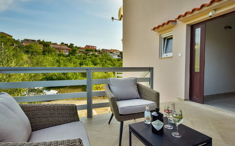 Milka: Furniture, Table, Property, Building, Plant, Sky, Shade, Houseplant, Interior Design, Outdoor Furniture