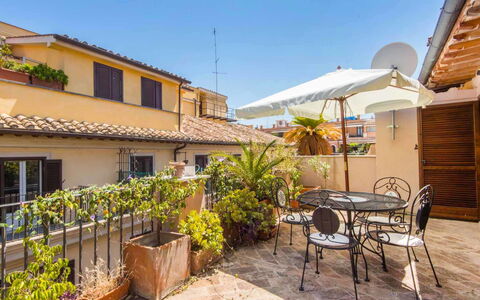 Charming Terrace: Plant, Sky, Furniture, Building, Window, Flowerpot, Chair, Table, Shade, Neighbourhood