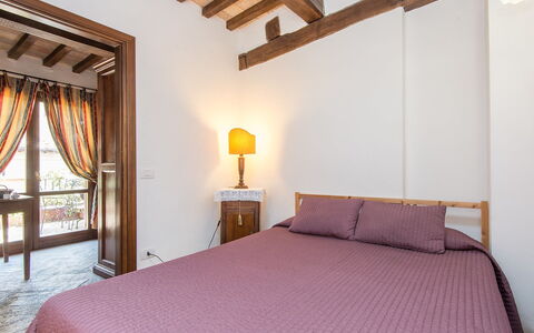 Charming Terrace: Bedroom, Bed, Furniture, Room, Property, Bed Sheet, Bed Frame, Interior Design, Mattress, Ceiling
