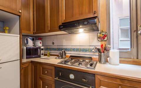 Navona: Cabinetry, Countertop, Property, Furniture, Building, Kitchen, Kitchen Appliance, Drawer, Kitchen Stove, Wood