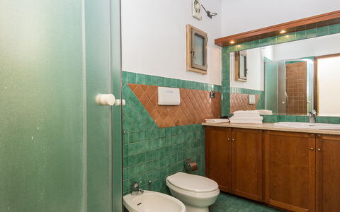 Navona: Mirror, Plumbing Fixture, Sink, Bathroom Sink, Tap, Bathroom Cabinet, Bathroom, Cabinetry, Toilet Seat, Purple