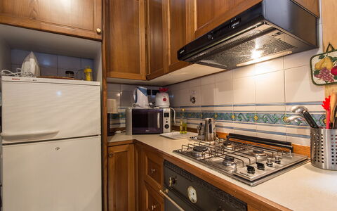 Navona: Cabinetry, Countertop, Property, Furniture, Kitchen Appliance, Gas Stove, Kitchen Stove, Kitchen, Home Appliance, Wood