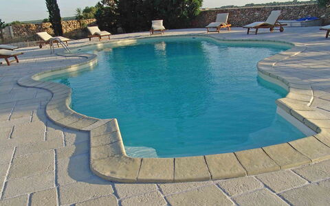 Tenuta Nucci: Swimming Pool, Property, Azure, Water, Flagstone, Vacation, Leisure, Rock, Tourism