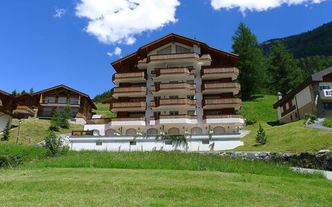 Leukerbad 200: Cloud, Sky, Plant, Building, Tree, Mountain, Natural Landscape, Window, Land Lot, Wood