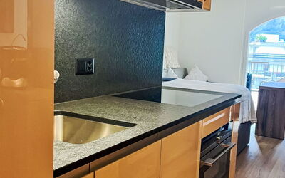 B05 200.7: Cabinetry, Countertop, Property, Kitchen Sink, Sink, Kitchen, Kitchen Appliance, Wood, Kitchen Stove, Lighting