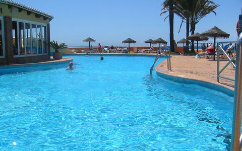 Dona Lola: Swimming Pool, Resort, Vacation, Leisure, Property, Town, Resort Town, Water, Leisure Centre, Hotel
