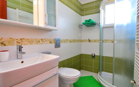Vodice Tribunj 104: Bathroom, Property, Green, Room, Interior Design, Tile, Architecture, Building, Bathtub, Real Estate