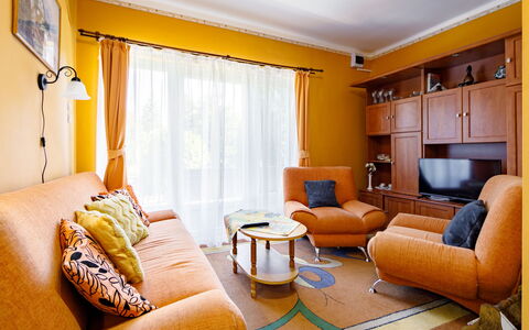 Verde: Furniture, Property, Couch, Comfort, Building, Table, Orange, Interior Design, Living Room, Wood