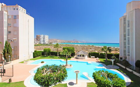 Cabo Mar: Plant, Water, Sky, Building, Azure, Swimming Pool, Urban Design, Body Of Water, Tree, Condominium