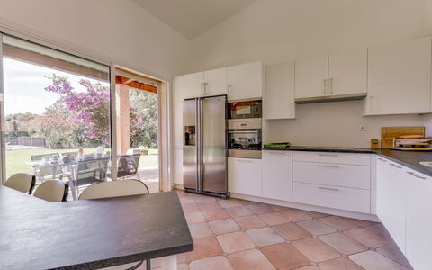 Cassou: Cabinetry, Countertop, Furniture, Building, Kitchen Appliance, Kitchen Stove, Wood, Kitchen, Plant, Interior Design