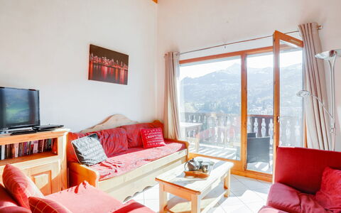 Saint Gervais 425: Furniture, Couch, Property, Picture Frame, Comfort, Orange, Table, Interior Design, Living Room, Lighting