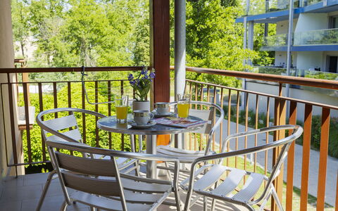 Catalpa: Furniture, Chair, Outdoor Furniture, Porch, Balcony, Shade, Outdoor Table, Deck, Eco Hotel, Wood Stain