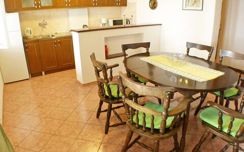 Tija: Room, Property, Furniture, Floor, Building, Interior Design, Table, Dining Room, House, Kitchen