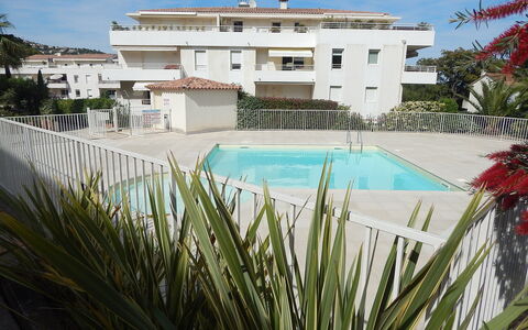 Cavalaire 350: Water, Plant, Sky, Building, Property, Window, Azure, Swimming Pool, Tree, Cloud