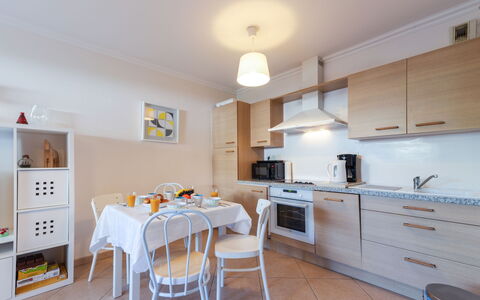 Cavalaire 350: Countertop, Cabinetry, Furniture, Table, Kitchen Sink, Kitchen Appliance, Kitchen, Building, Wood, Chair