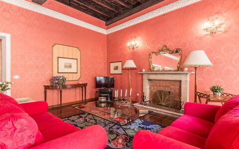 Spanish Steps: Room, Property, Pink, Red, Interior Design, Furniture, Living Room, Wall, Building, Ceiling