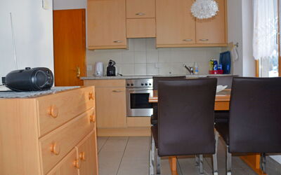 Wohnung 1 400.1: Room, Furniture, Property, Kitchen, Cabinetry, Major Appliance, Kitchen Stove, Building, House, Floor