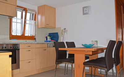 Wohnung 4 400.4: Room, Furniture, Property, Building, Cabinetry, Kitchen, Table, Interior Design, Dining Room, Floor